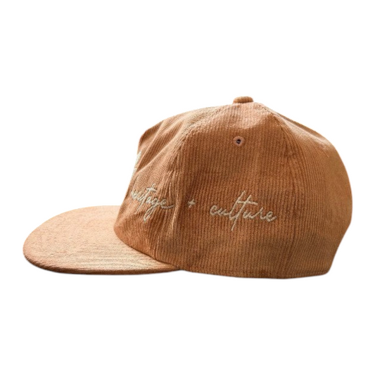 KA'EO Apparel vintage rose corduroy hat featuring delicate heritage + culture embroidery on a dark studio background.