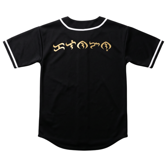 KA'EO Apparel black baseball jersey featuring gold Baybayin script on the back with white piping trim.