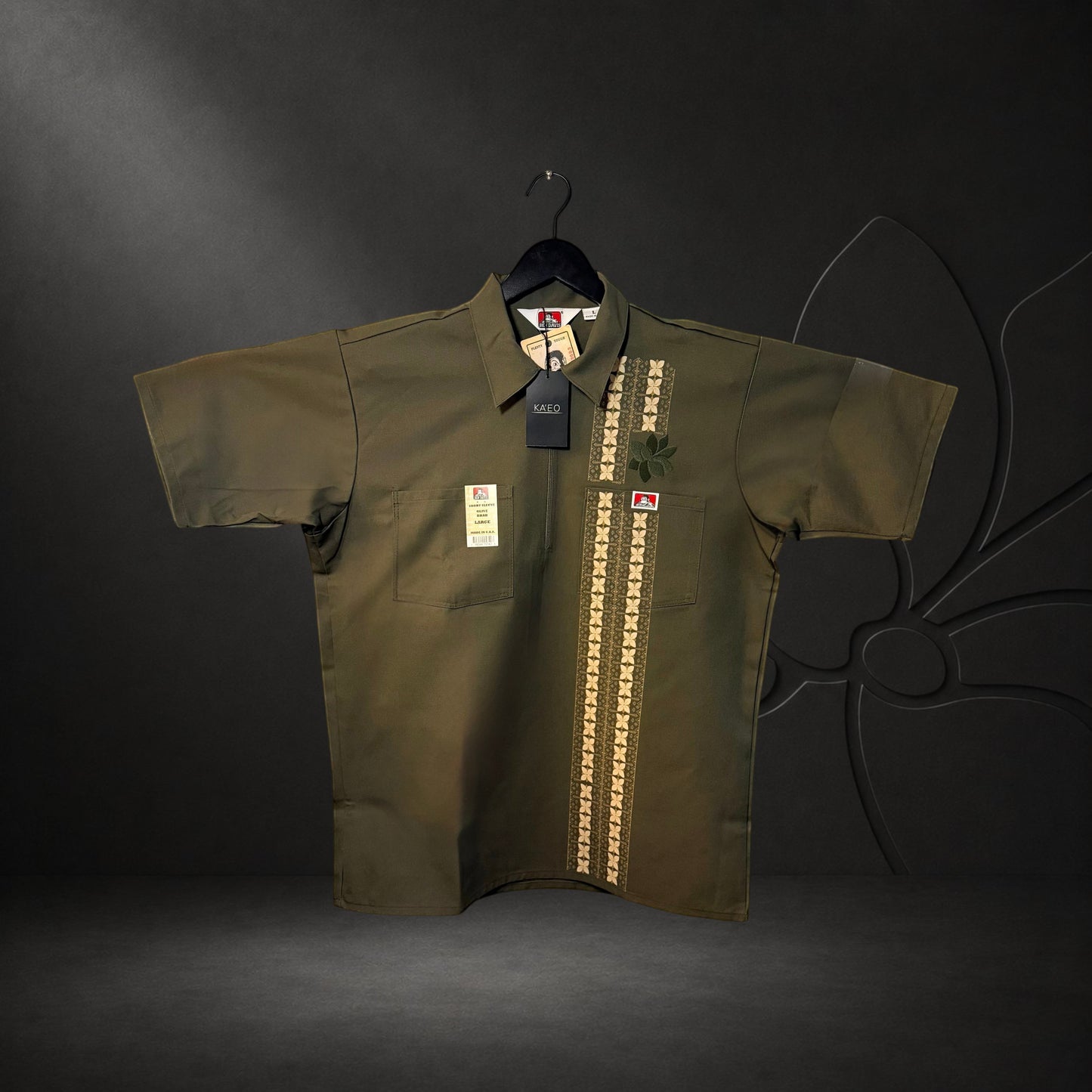 KA'EO Apparel x Ben Davis olive green poly-cotton work shirt with quarter-zip, chest pockets, and Barong print.