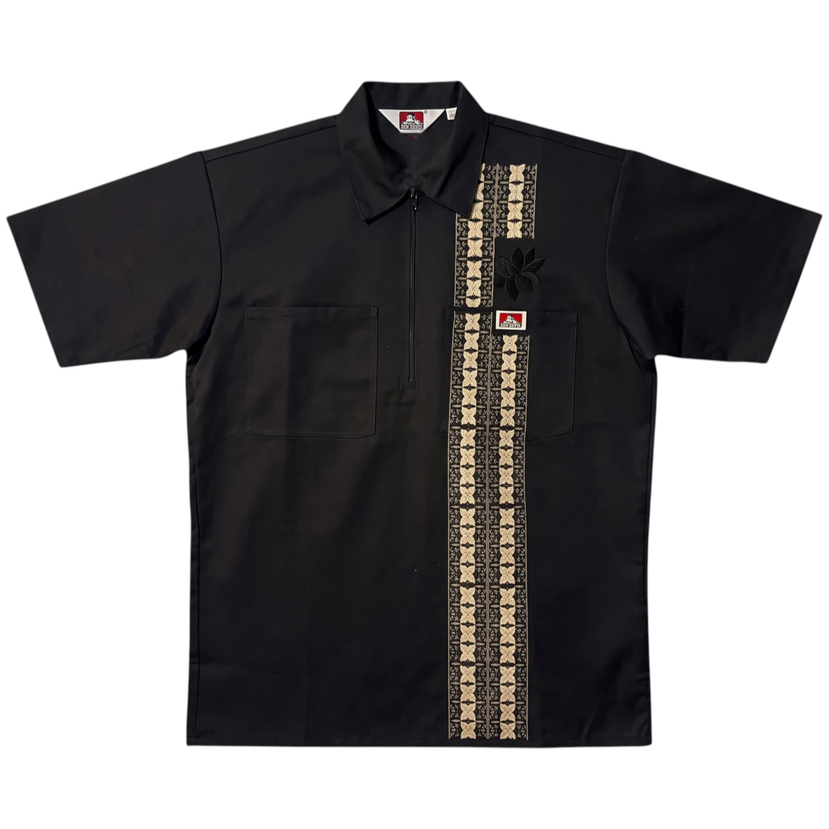 KA'EO Apparel x Ben Davis black poly-cotton work shirt with a quarter-zip, chest pockets, and Barong-inspired print.