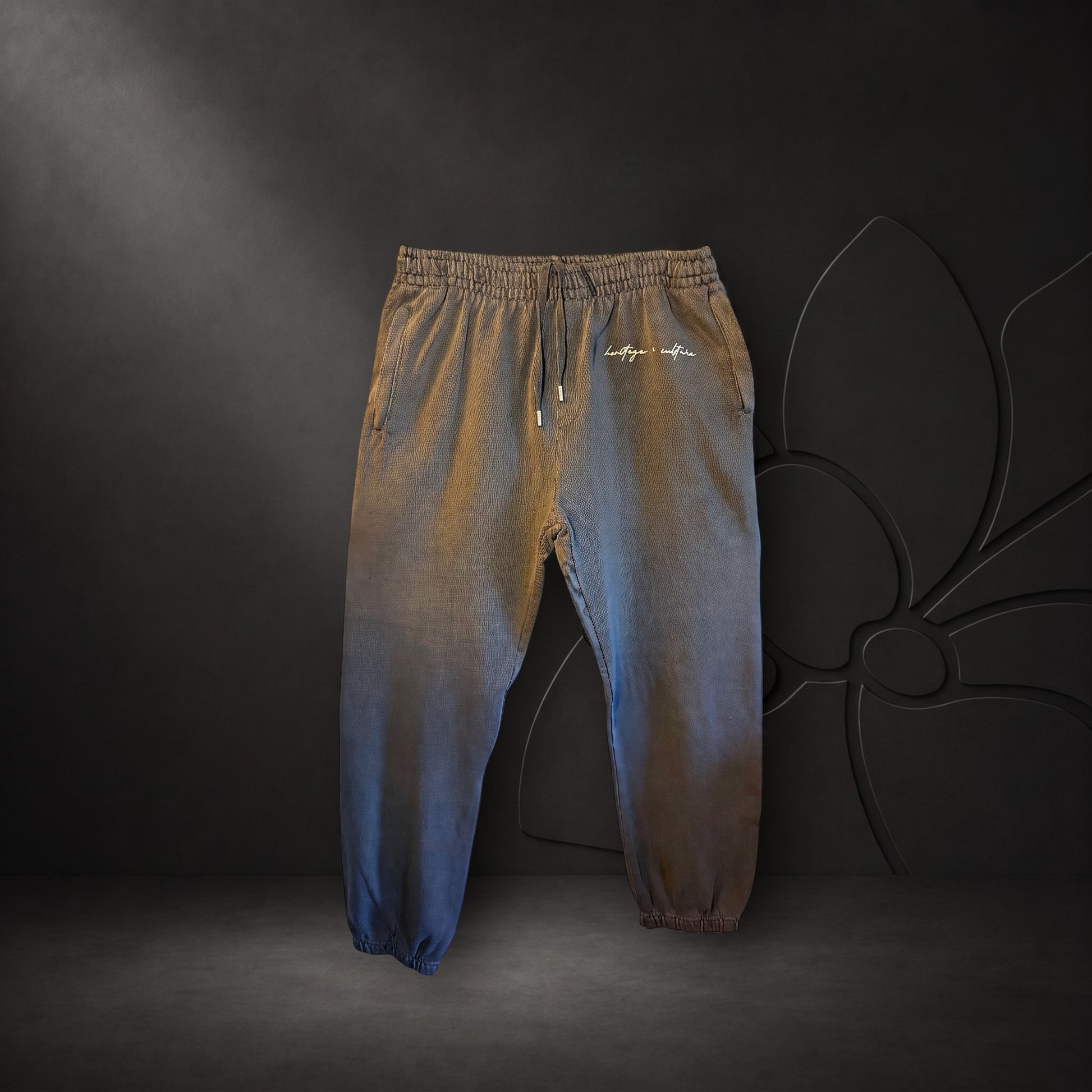 KA'EO Apparel charcoal heavyweight cotton joggers with elastic waistband, drawstring, and embroidered logo detail.