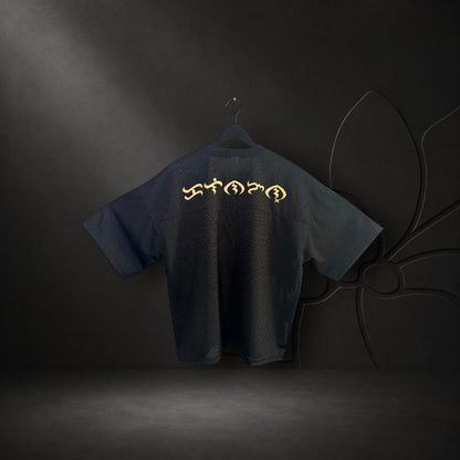 KA'EO Apparel black mesh cropped football jersey featuring gold Baybayin script on the back