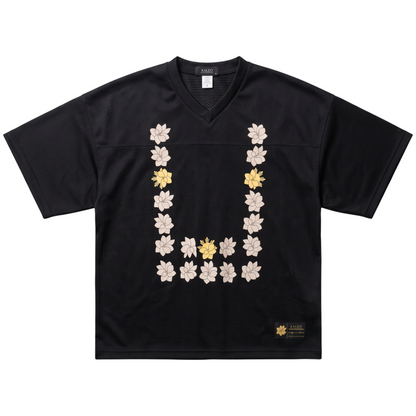 KA'EO Apparel cropped football jersey in black mesh featuring a cream and yellow Sampaguita floral Barong print.