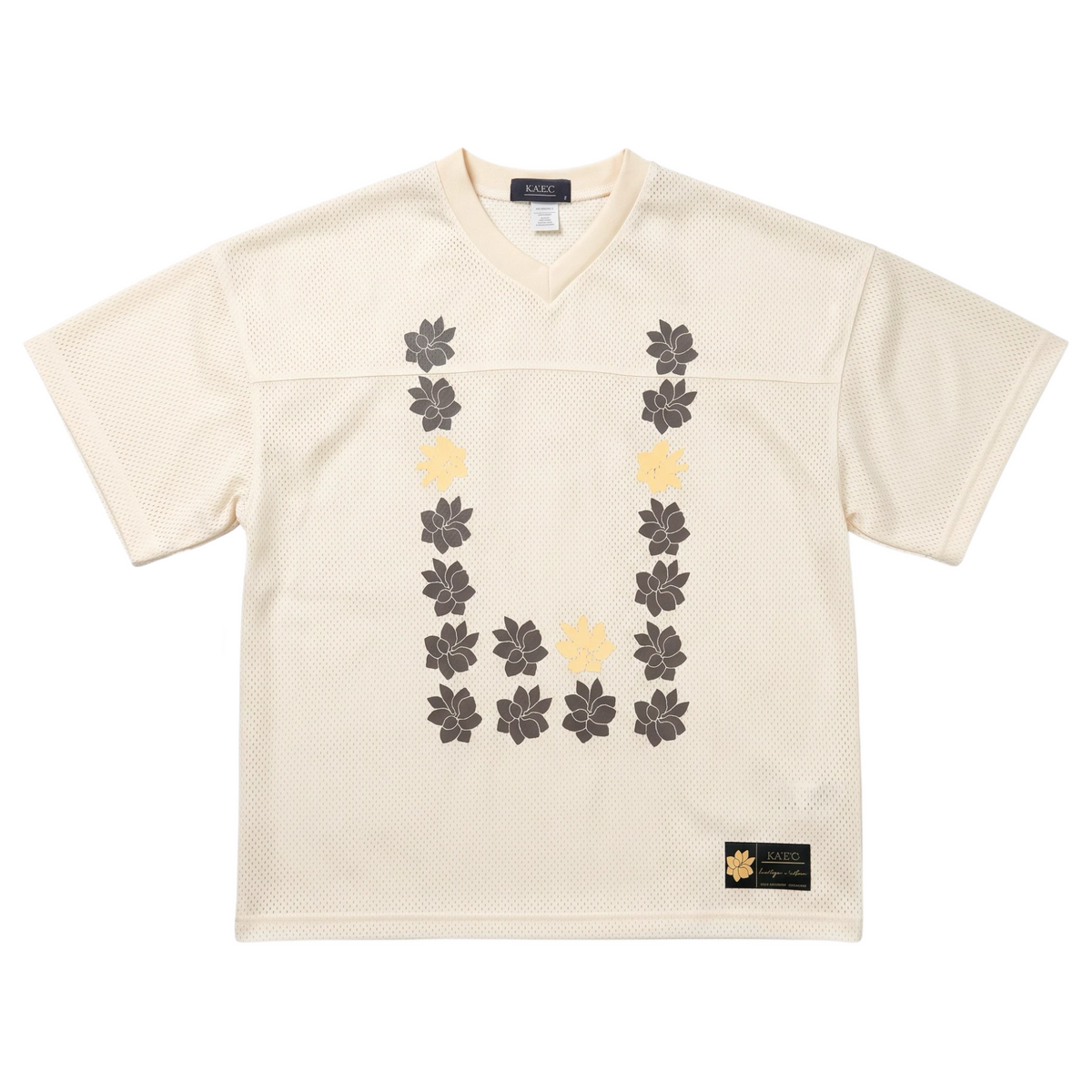 KA'EO Apparel cream mesh cropped football jersey with brown and yellow Sampaguita flower graphic in a U-shape design.