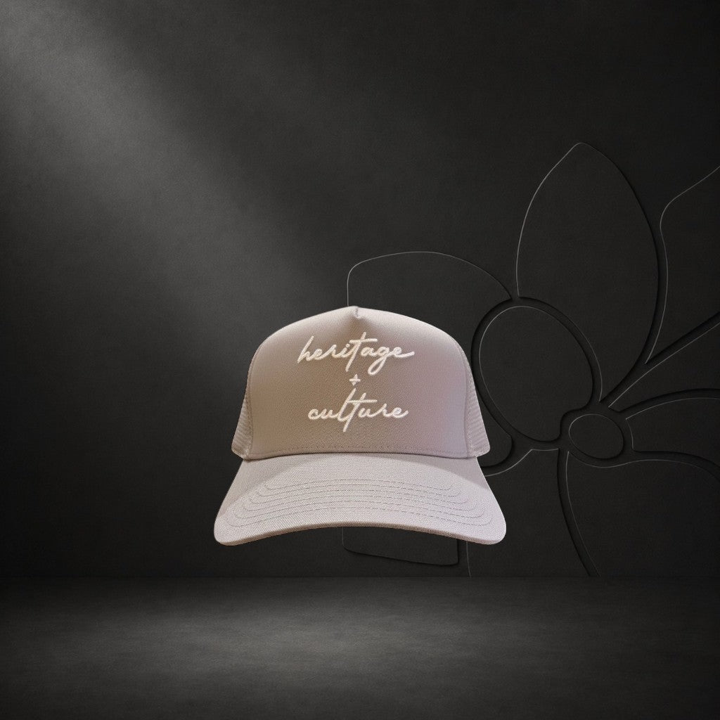 KA'EO Apparel gray cotton snapback cap with embroidered 'heritage + culture' text and curved brim.