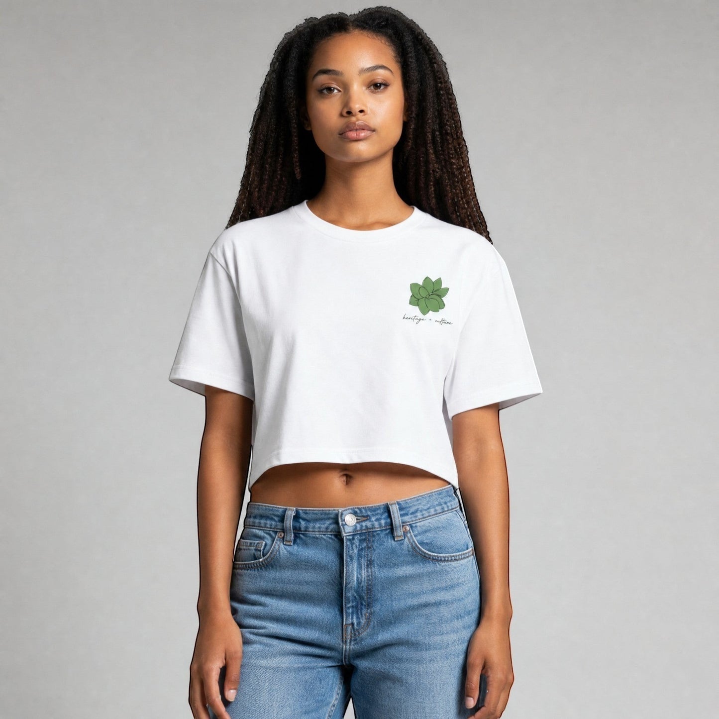 KA'EO Apparel white cotton cropped t-shirt with green Sampaguita graphic and "heritage + culture" text.
